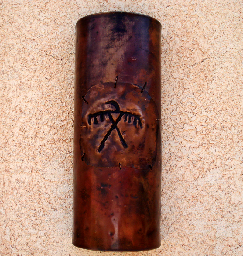 Copper Thunderbird Copper Thunderbird light sconce.