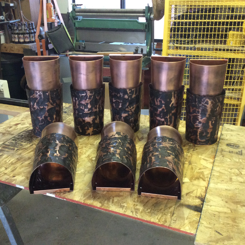 Copper sconce // rustic style // lighting in the copepr shop at Mike Dumas Copper Designs.